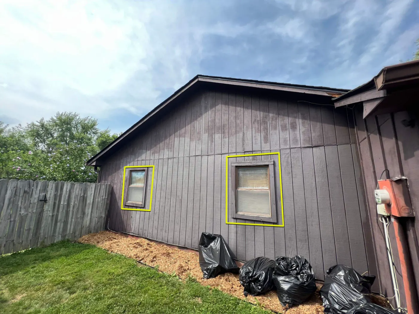 Storm-damaged window documented in Sand Creek Woods