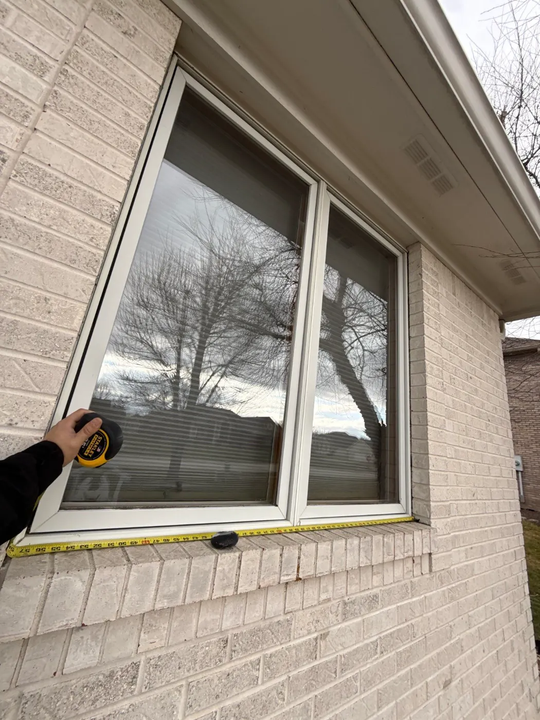 Window replacement documented in Sand Creek Woods